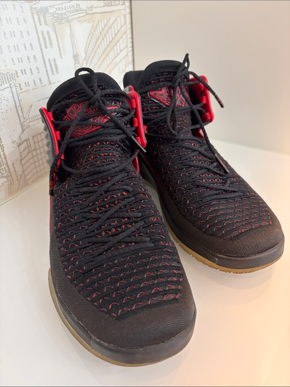 Jordan Men’s Black with Red Accents High-Top Sneakers